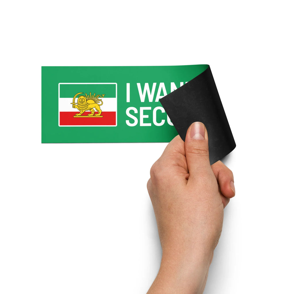 Hand peeling sticker with Lion and Sun emblem and 'I WANT SEC' text on green background