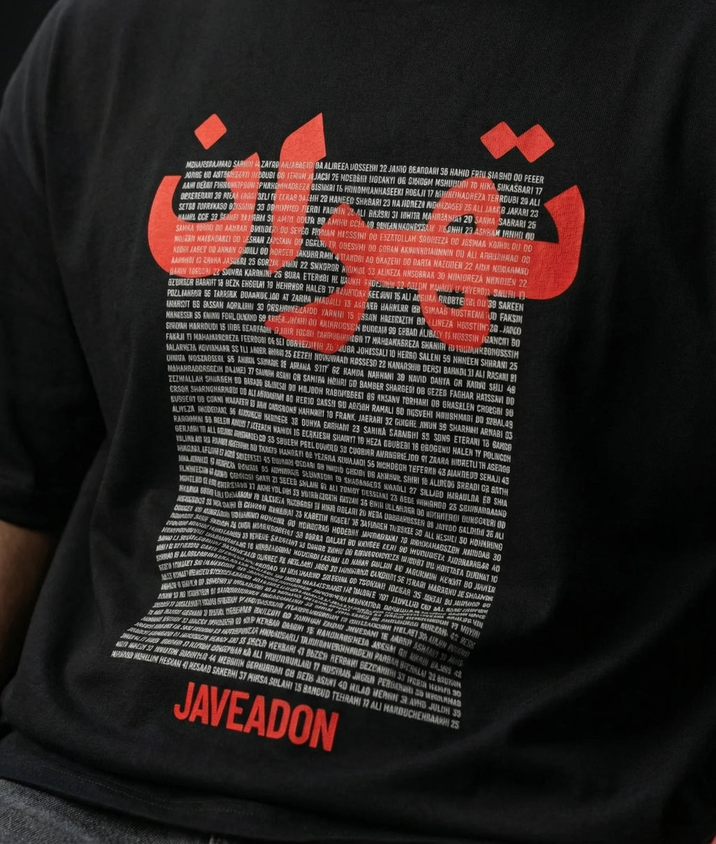 Black Javeadon t-shirt with bold red lion graphic and Persian text, modern streetwear design